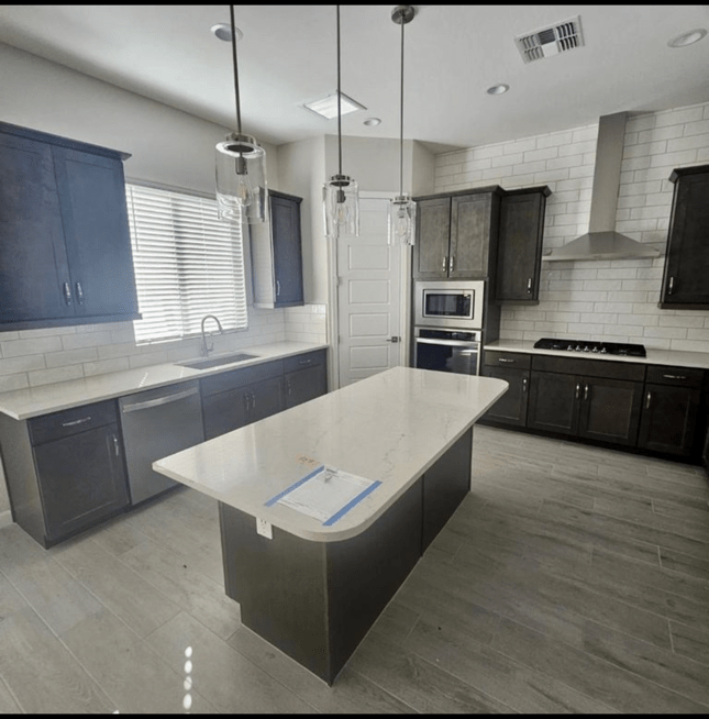 kitchen remodel with cabinets, appliances, lighting, & flooring by C. Watkins Construction, Oakland CA licensed general contractor